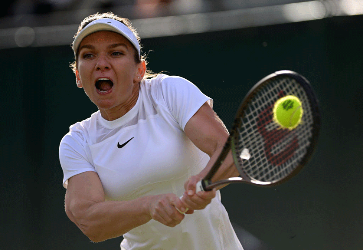 Romania's Simona Halep plays a forehand against Belgium's Kirsten Flipkens during their second round match