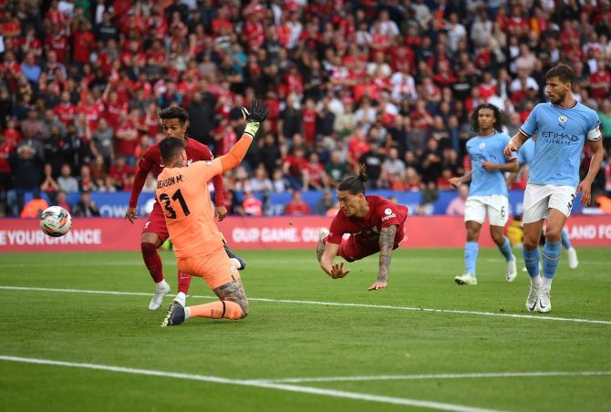 Manchester City goalkeeper attempts to make a save as  Darwin Nunez scores Liverpool's third goal with a header in the Community Shield match against Manchester City at the King Power Stadium in Leicester on Saturday.