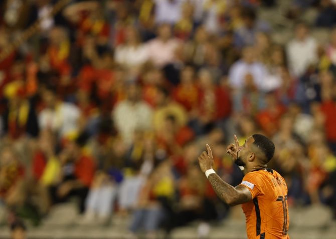 Memphis Depay celebrates scoring the Netherlands' fourth goal against Belgium in the Nations League match at King Baudouin Stadium in Brussels, on Friday.
