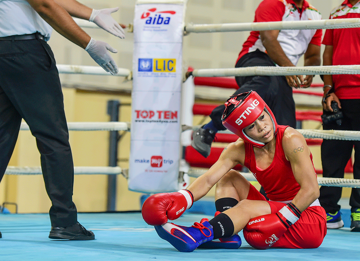 Mary Kom, whose left knee was heavily bandaged after the fall, was then taken to the hospital for scans.
