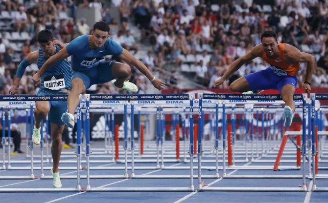 Devon Allen of the United States on his way to winning the men's 110m hurdles.
