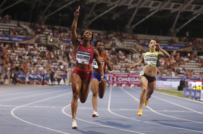 Jamaica's Shelly-Ann Fraser-Pryce celebrates after crossing the finish line to win the women's 100 metres in the Diamond League meet at Stade Charlety, in Paris, on Saturday.