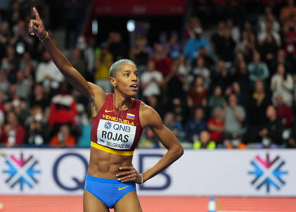 Venezuela's Yulimar Rojas celebrate winning gold and setting a new world record in the women's triple jump final at the World Athletics Indoor Championships - Stark Arena, Belgrade, Serbia, on Sunday