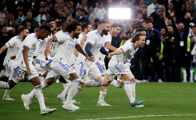 Real Madrid players celebrate victory over Manchester City in the second leg semi-final and entering the UEFA Champions League final, at Estadio Santiago Bernabeu in Madrid, Spain, on Wednesday.