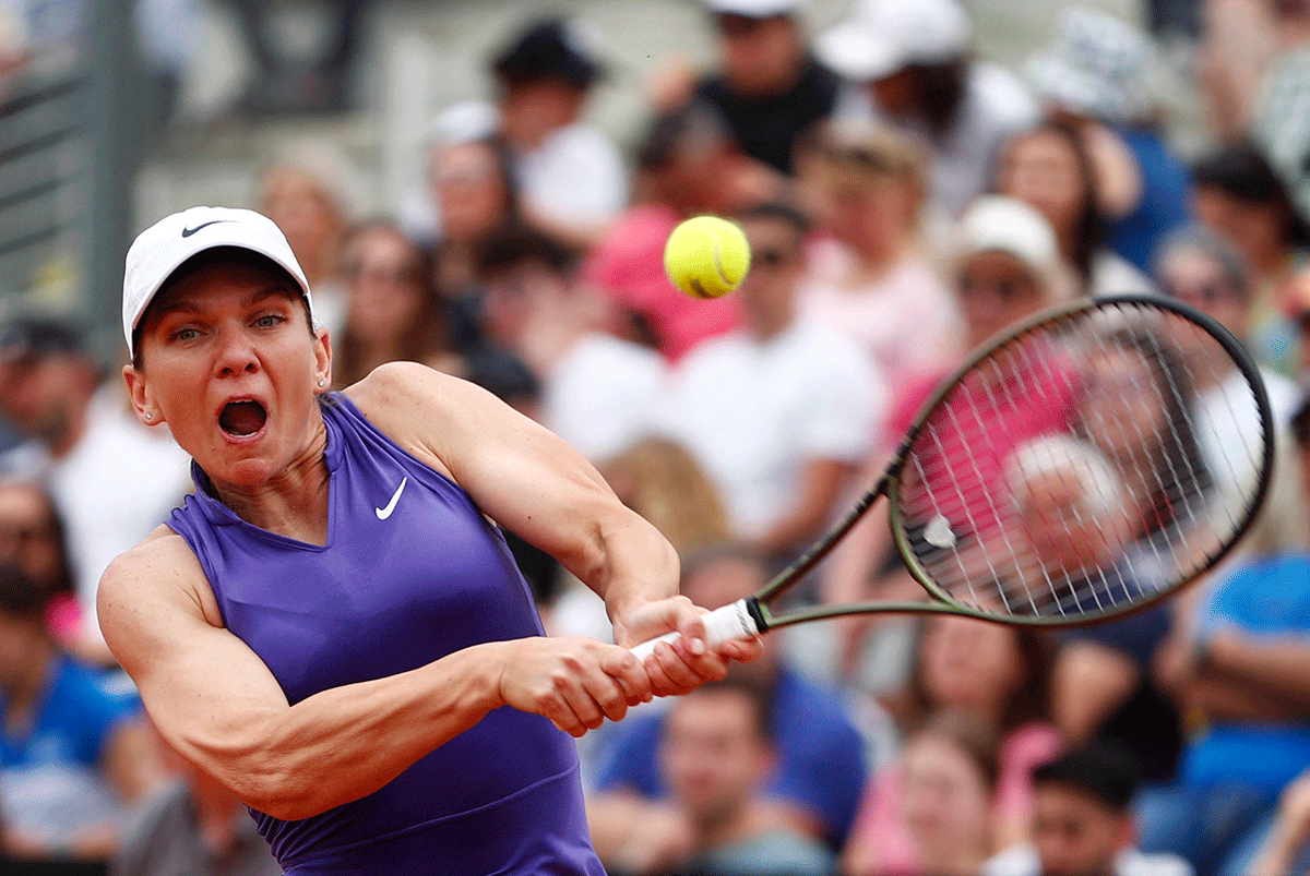Romania's Simona Halep in action during her first round match against France's Alize Cornet at the WTA 1000 Italian Open at Foro Italico, Rome, Italy, on Monday