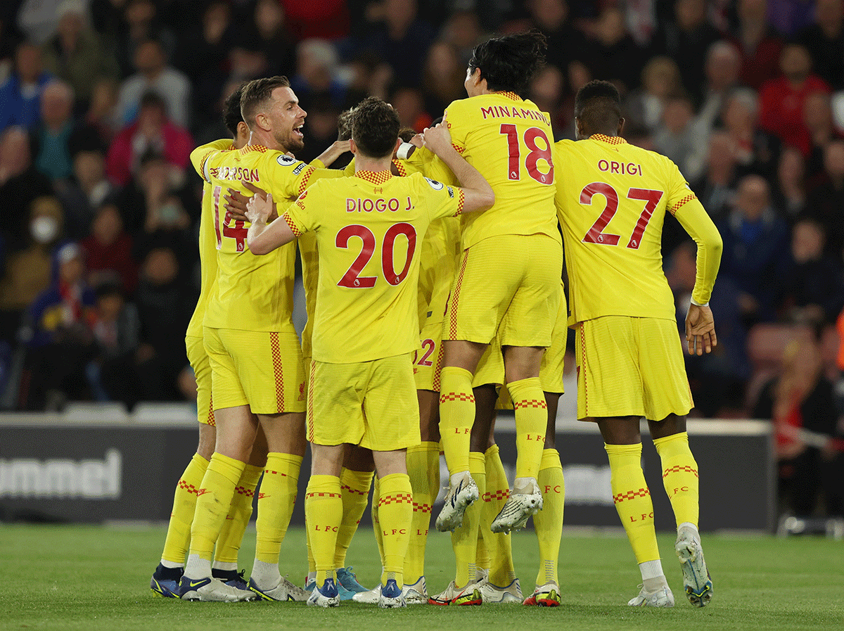 Liverpool's Joel Matip celebrates with teammates on scoring their second goal against Southampton at St Mary's Stadium on Tuesday