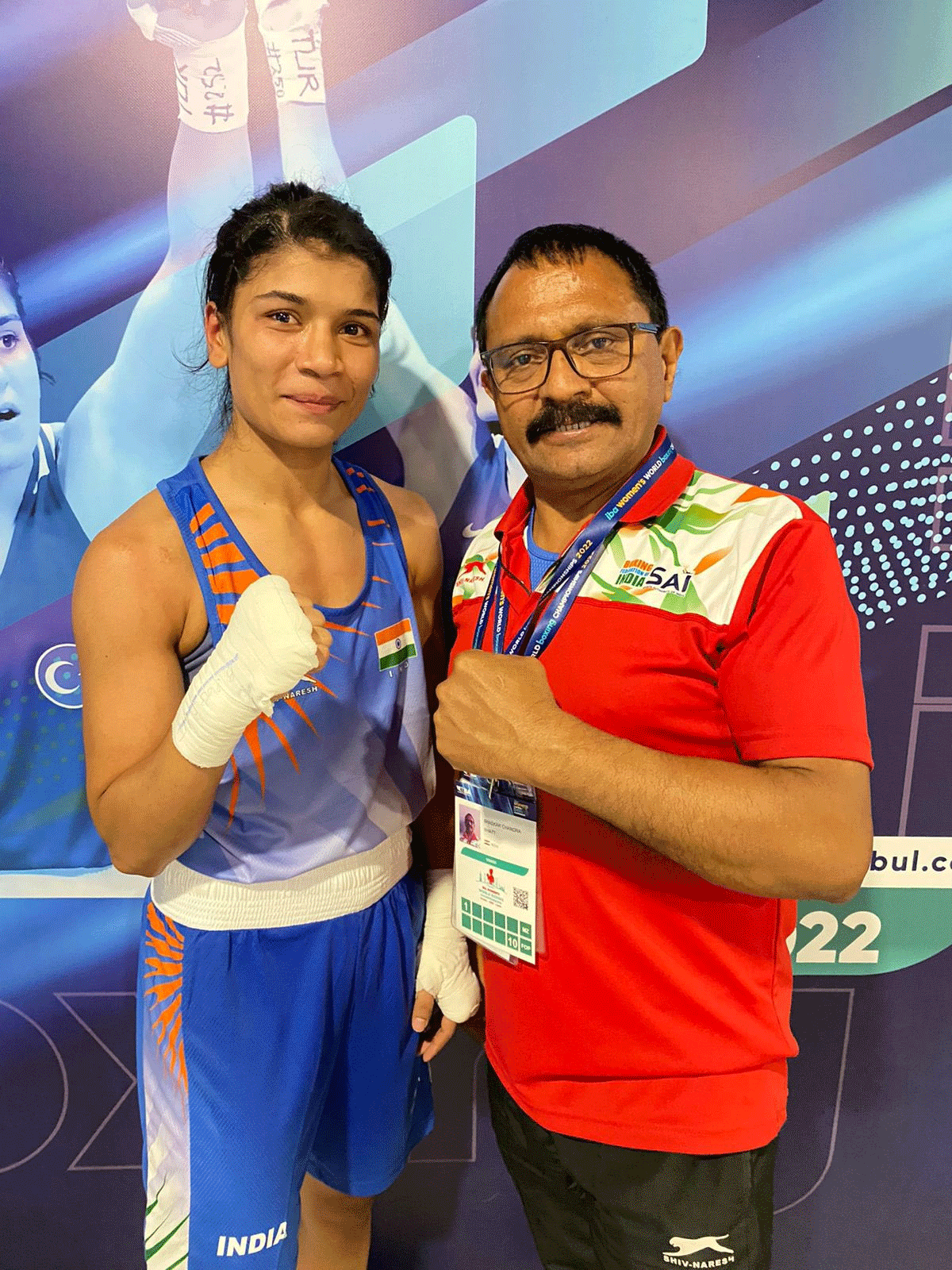 Nikhat Zareen with her coach after the bout 