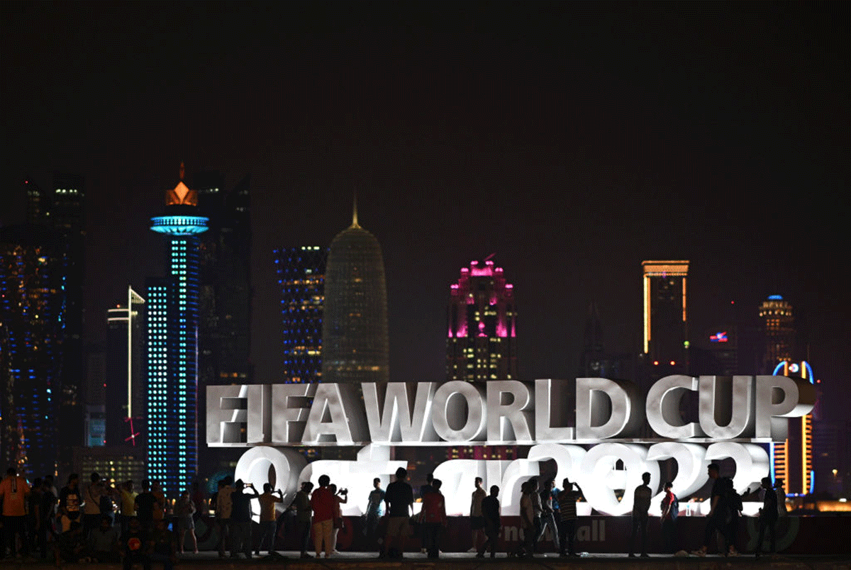 Football fans are pictured at the Corniche ahead of the FIFA World Cup Qatar 2022 in Doha, Qatar, on Friday