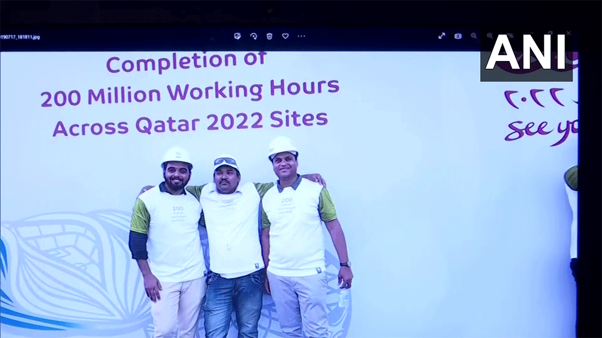 Shahid Ali, right, and his colleagues after the completion of football stadiums in Qatar