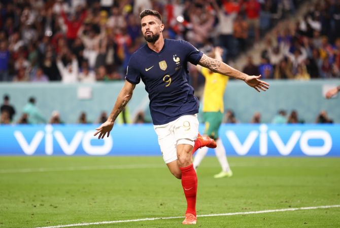 Olivier Giroud celebrates scoring France's second goal.