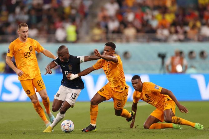 Enner Valencia of Ecuador battles for possession with Jurrien Timber of Netherlands during the FIFA World Cup Qatar 2022 Group A match