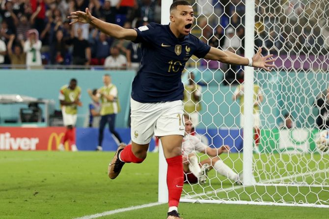France's Kylian Mbappe celebrates scoring their second goal 