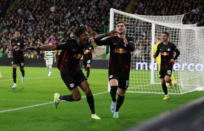 Timo Werner celebrates scoring RB Leipzig's first goal with Mohamed Simakan in the Group F match against Celtic at Celtic Park, Glasgow, Scotland. 
