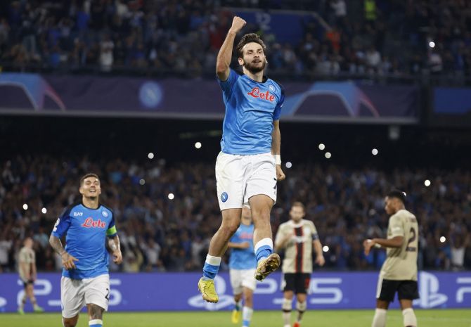 Khvicha Kvaratskhelia celebrates scoring Napoli's third goal in the Champions League Group A match against Ajax Amsterdam at Stadio Diego Armando Maradona, Naples, Italy.