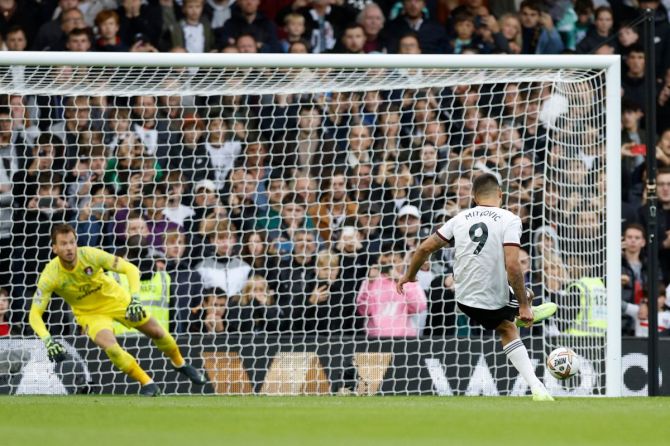 Fulham's Aleksandar Mitrovic scores their second goal from the penalty spot