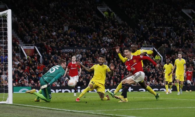 Cristiano Ronaldo scores Manchester United's third goal during the Europa League Group E match against Sheriff Tiraspol, at Old Trafford, Manchester, on Thursday.
