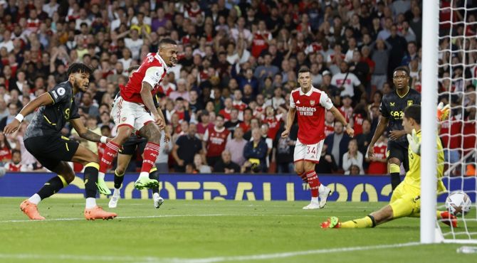 Gabriel Jesus scores Arsenal's first goal against Aston Villa, at Emirates Stadium, London.