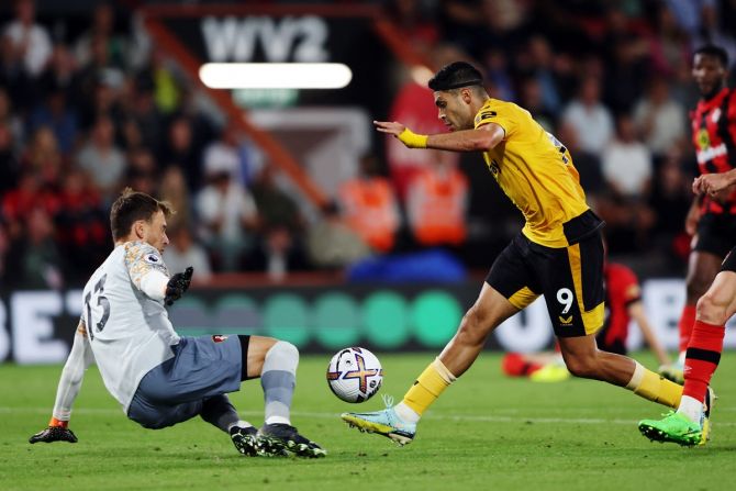 Wolverhampton Wanderers striker Raul Jimenez is thwarted by Bournemouth goalkeeper Neto, at Vitality Stadium, Bournemouth. 