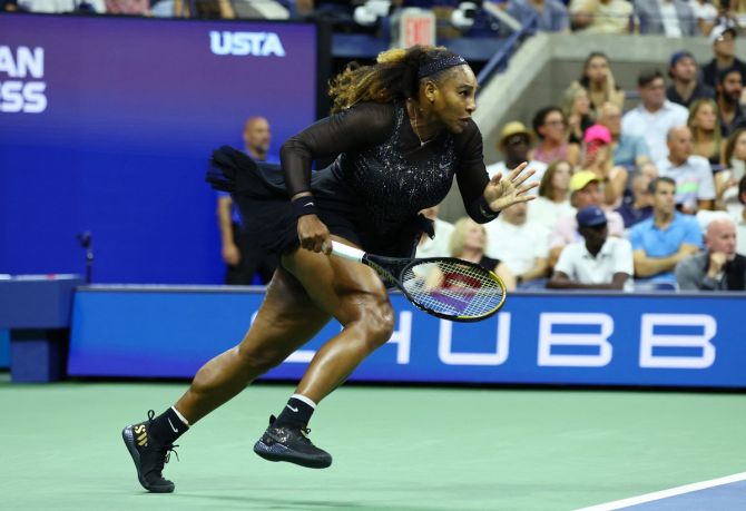 Serena Williams successfully rushes to the net to return a drop from Anett Kontaveit.