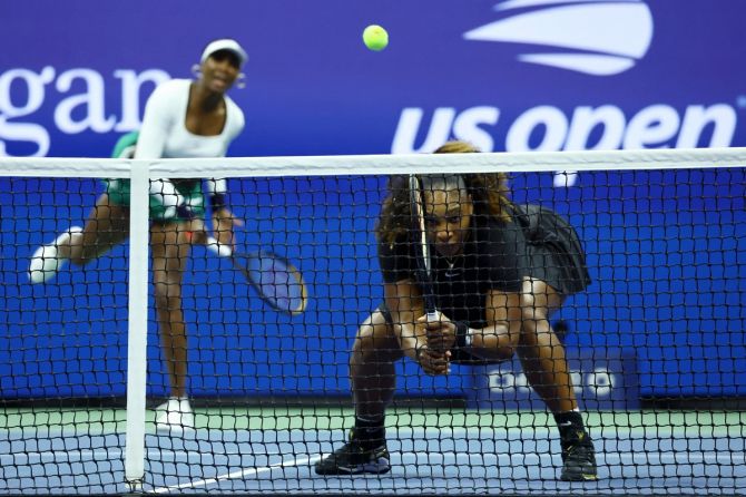 Serena Williams and Venus Williams in action during their US Open women's doubles first round match against the Czech Republic's Linda Fruhvirtova and Lucie Hradecka on Thursday.