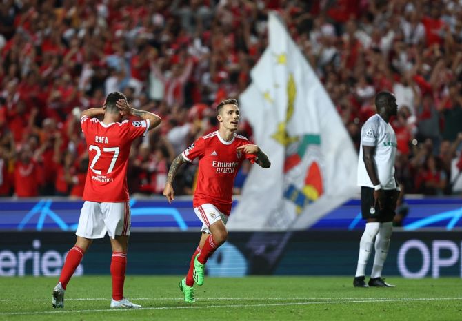 Alejandro Grimaldo celebrates scoring Benfica's second goal in the Group H match against Maccabi Haifa, at Estadio da Luz, Lisbon, Portugal.