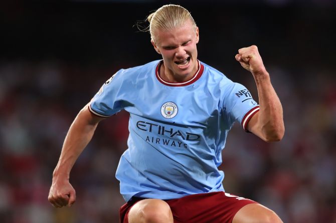 Erling Haaland celebrates scoring Manchester City's third goal during the UEFA Champions League Group G match against Sevilla FC, at Estadio Ramon Sanchez Pizjuan in Seville, Spain, on Tuesday.