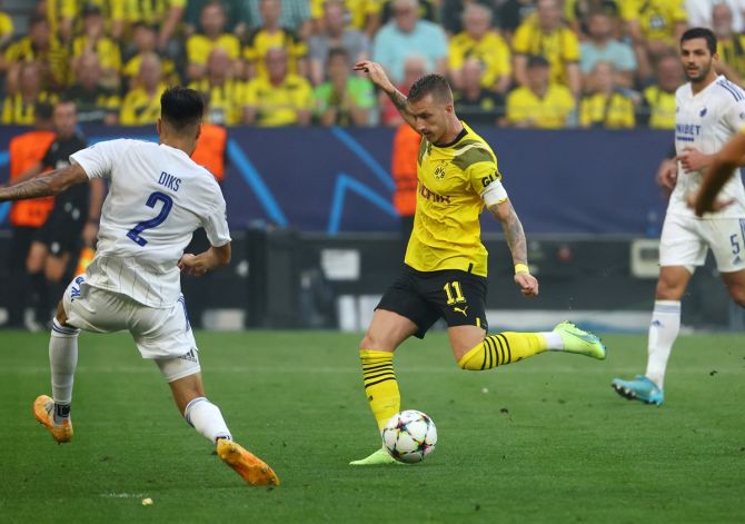 Marco Reus scores Borussia Dortmund's first goal in the Group G match against FC Copenhagen, at Signal Iduna Park, Dortmund, Germany.