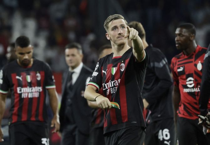 AC Milan's Alexis Saelemaekers acknowledges the applause from fans after the Group E match against FC Salzburg, at Red Bull Arena Salzburg, Austria.