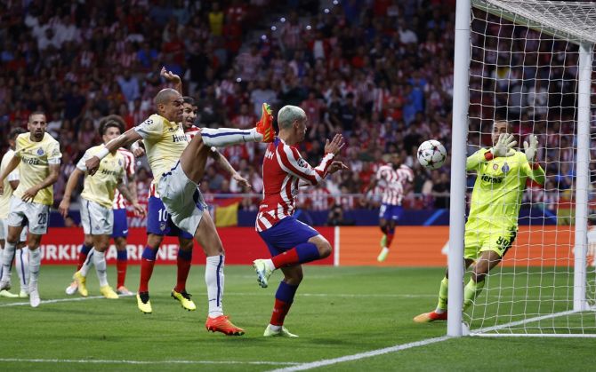 Antoine Griezmann scores Atletico Madrid's second goal in the Group B match against FC Porto, at Metropolitano, Madrid.