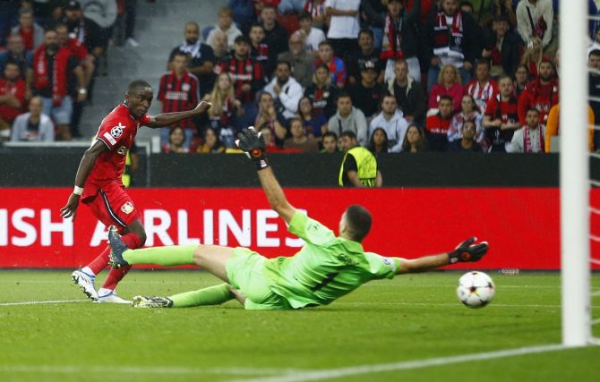 Moussa Diaby scores Bayer Leverkusen's second goal in the Group B match against Atletico Madrid, at BayArena, Leverkusen, Germany.