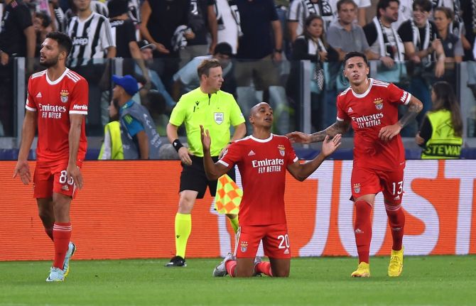 Joao Mario reacts after drawing Benfica level from the penalty spot in the Group H match against Juventus, at Allianz Stadium, Turin, Italy.