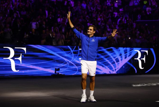 Roger Federer waves to fans at the end of his Laver Cup match, his last after announcing his retirement, at 02 Arena, in London, on Friday.