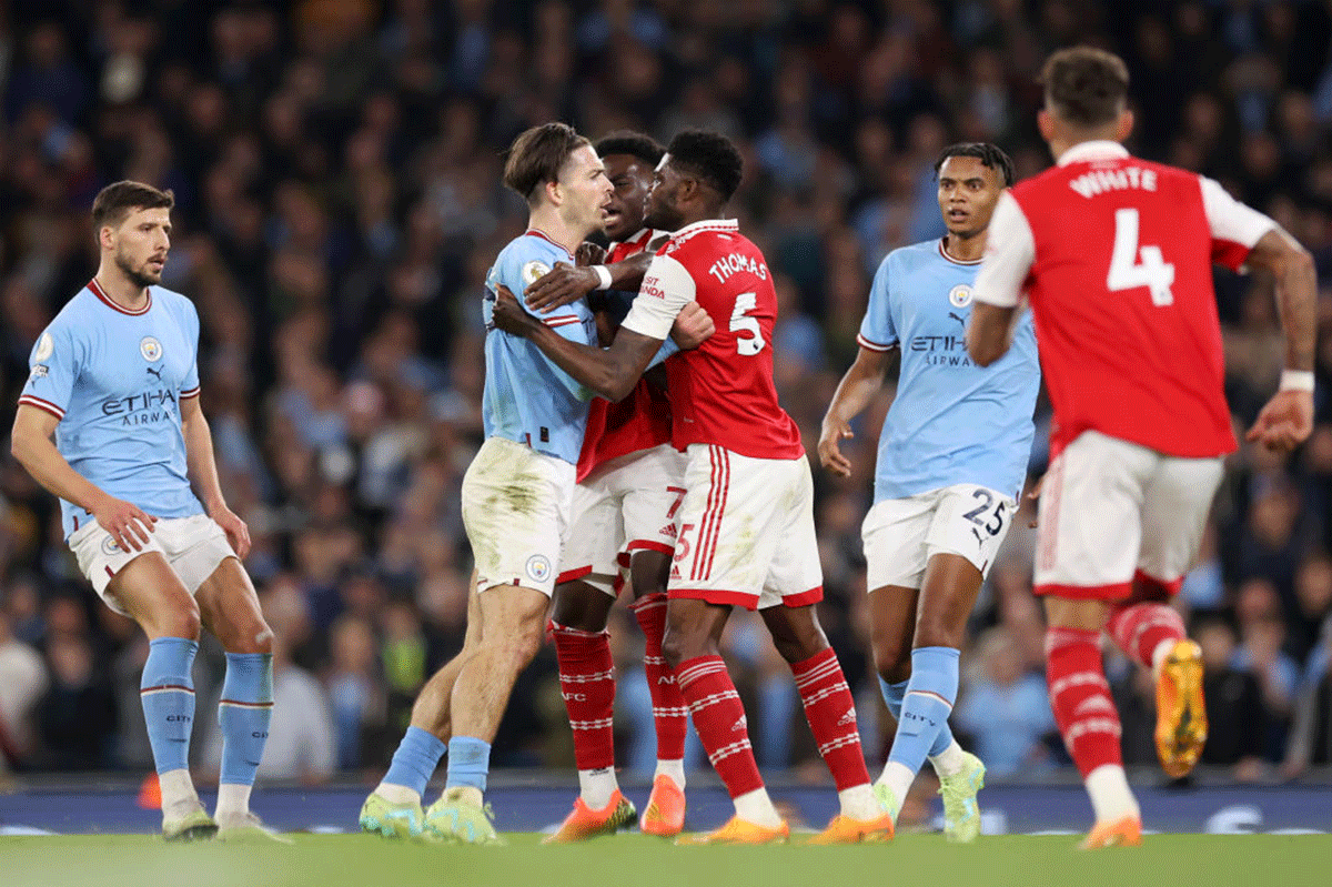 Man City's Jack Grealish clashes with Arsenal's Thomas Partey and Bukayo Saka