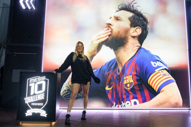 A woman attends the launching of the show Messi10 by Cirque du Soleil, inspired by the life, values ​​​​and career of Argentine soccer star Lionel Messi, in Buenos Aires, Argentina