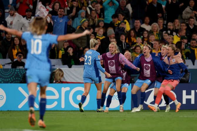 England's Alessia Russo celebrates scoring their third goal with teammates during the FIFA Women's World Cup semi-final at Stadium Australia, Sydney, on Wednesday 
