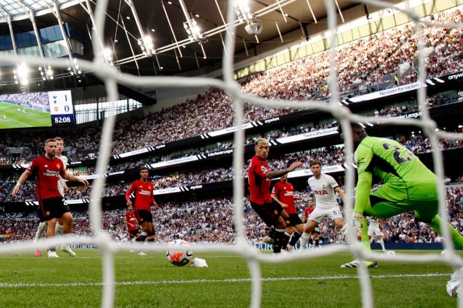 Tottenham Hotspur's Ben Davies scores their second goal past Manchester United's Andre Onana during their match at Tottenham Hotspur Stadium, London, on Saturday
