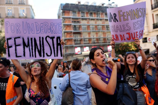 People hold banners and protest against Royal Spanish Football Federation President Luis Rubiales - Plaza Callao, Madrid for his unsolicited kiss on Spain player Jennifer Hermoso's lips after the Women's World Cup Final on Sunday, August 20.