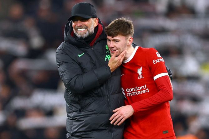 Liverpool's Conor Bradley celebrates with manager Juergen Klopp after the match against LASK Linz at Anfield, Liverpool on Thursday 