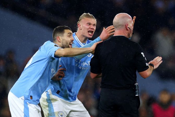 Manchester City's Erling Braut Haaland and Mateo Kovacic remonstrate with referee Simon Hooper late in the game against Tottenham Hotspur, on Sunda, after he stopped play when Jack Grealish was through on goal for a foul on Haaland in the build-up, having previously waved play-on 