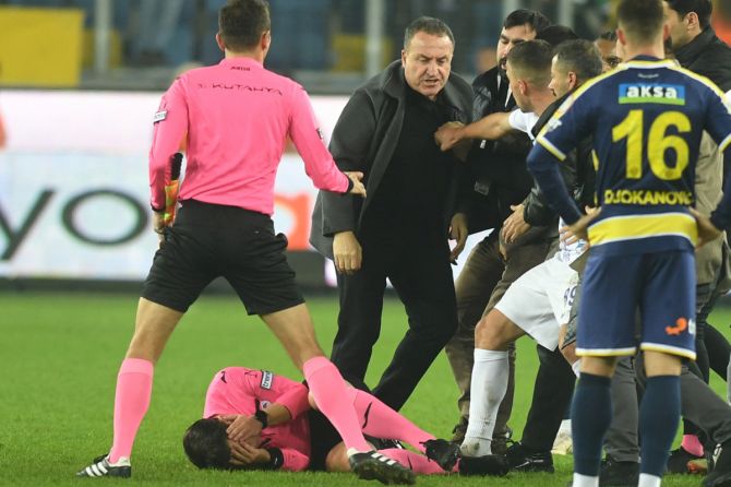 MKE Ankaragucu President Faruk Koca reacts after punching referee Halil Umut Meler to the ground at the end of their Super Lig home match against Caykur Rizespor after their Super Lig match at Eryaman Stadium in Ankara, Turkey, on Monday