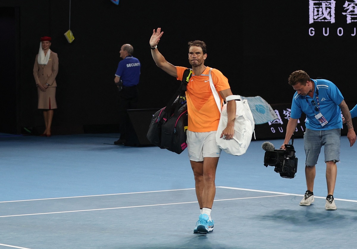 Spain's Rafael Nadal waves to the crowd as he leaves the court after losing his second round match against Mackenzie Mcdonald at the Australian Open, in Melbourne, on Wednesday.