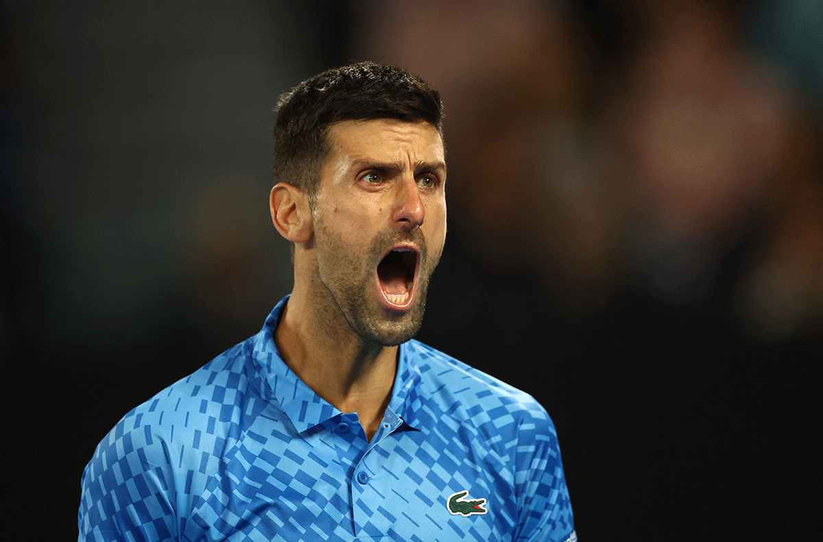 Novak Djokovic celebrates match point