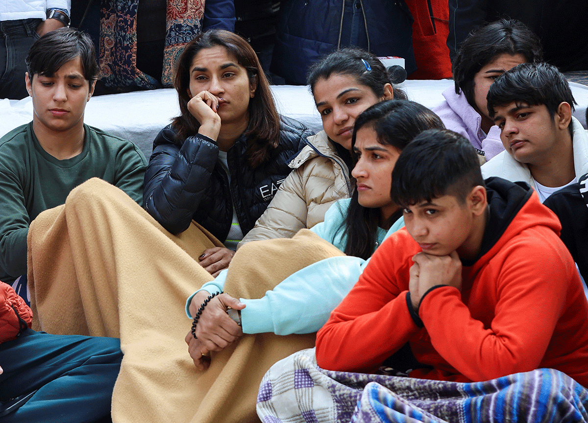 Vinesh Phogat, Sakshi Malik and other Indian wrestlers take part in a protest at Jantar Mantar in New Delhi, India, January 19, 2023. The wrestlers are demanding the disbandment of the WFI and the investigation of its head by the police, who they accuse of sexually harassing female players. 