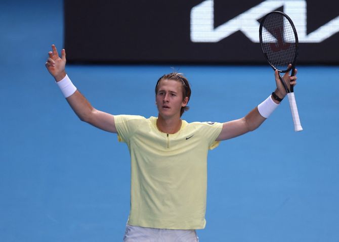 Sebastian Korda of the United States celebrates victory over Poland's Hubert Hurkacz in the fourth round of the Australian Open, at Melbourne Park, on Sunday.
