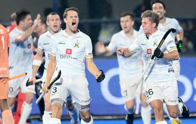 Belgium's players celebrate after clinching victory in the shoot-out.
