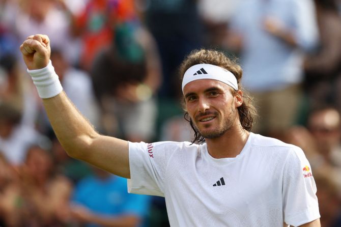 Greece's Stefanos Tsitsipas celebrates after winning his third round match against Serbia's Laslo Djere