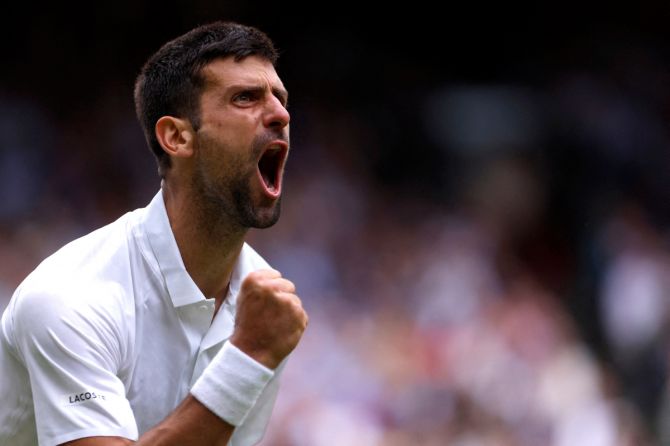 Serbia's Novak Djokovic celebrates winning the third set during his Wimbledon quarter-final match against Russia's Andrey Rublev at the All England Lawn Tennis and Croquet Club, in London on Tuesday 