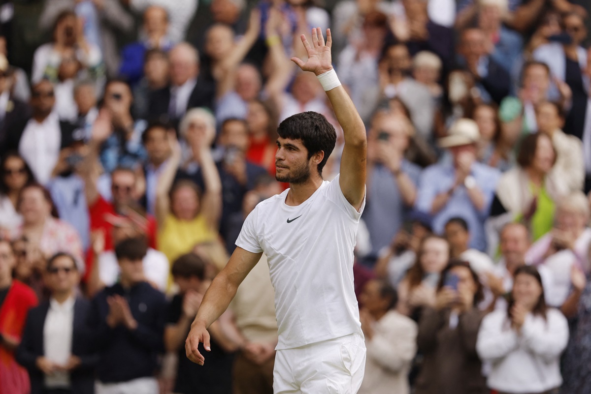 Spain's Carlos Alcaraz celebrates after beating Serbia's Novak Djokovic in the Wimbledon final,  at the All England Lawn Tennis and Croquet Club, London, July 16, 2023.