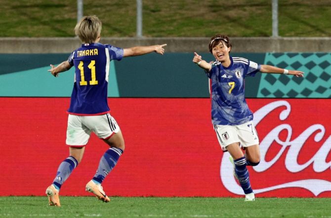 Hinata Miyazawa celebrates scoring Japan's opening goal with Mina Tanaka during the FIFA women’s World Cup Group C match against Zambia, at Waikato Stadium, Hamilton, New Zealand, on Saturday.'