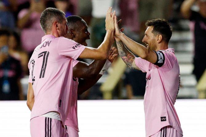 Inter Miami's Lionel Messi celebrates their fourth goal with teammates